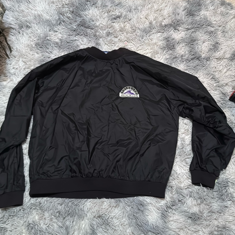 A Rockies windbreaker, size XL